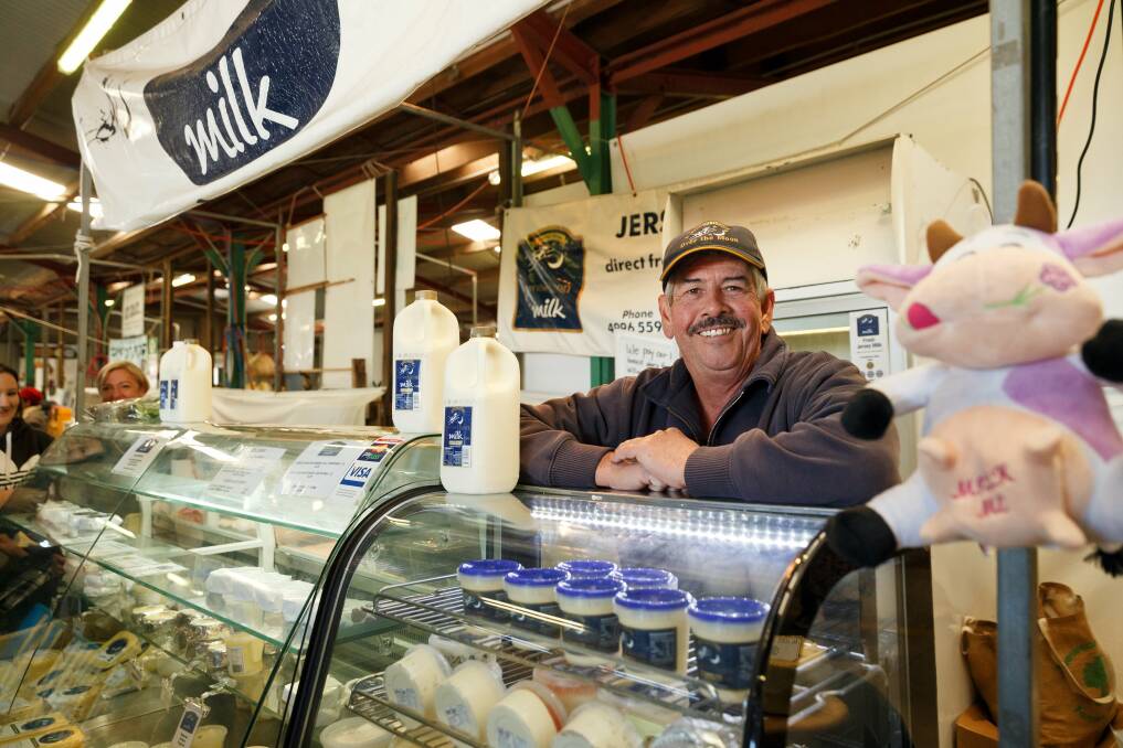TAKING A STAND: Karl Johnson sells his Over the Moon Milk in Newcastle. Mr Johnson insists on paying his dairy farmer suppliers 70 cents a litre. Picture: Max Mason-Hubers