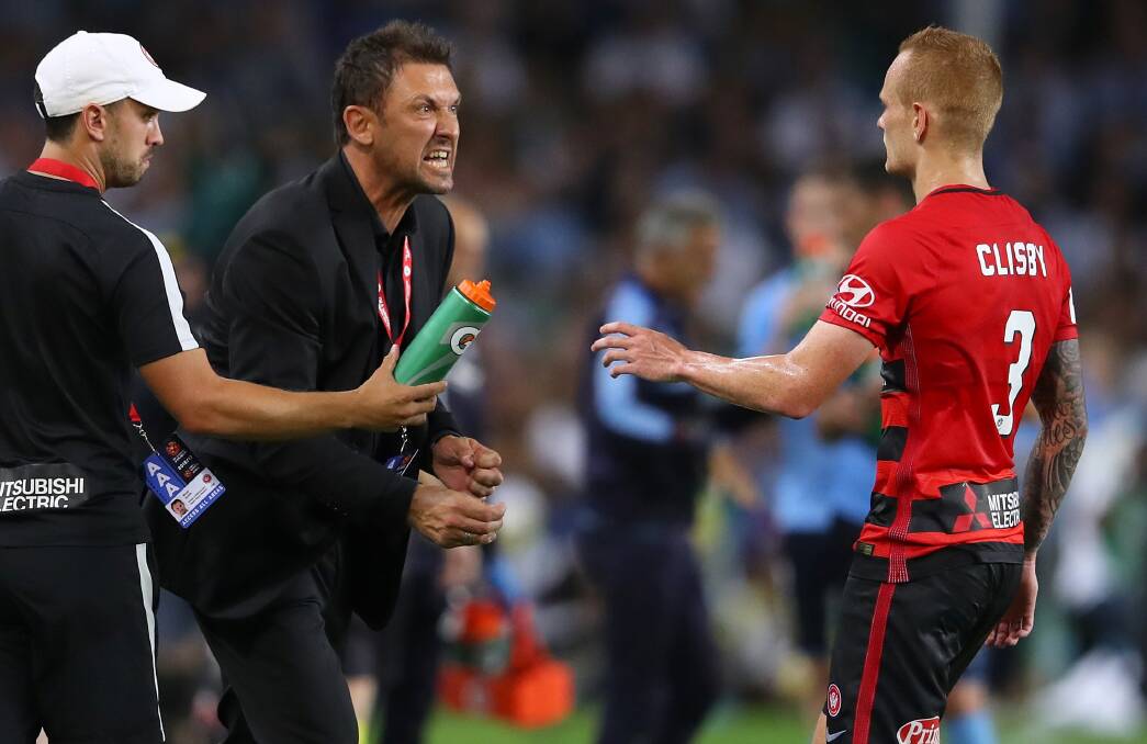LISTEN UP: Tony Popovic is fired up during the match. Picture: Getty Images