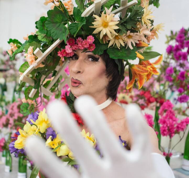 ENOUGH!: Bilpin Flower Show celebrity Miranda Fair is hounded by paparazzi at the 2014 show. She'll be there again this year, in yet another entertaining and uplifting outfit. Picture: Geoff Jones