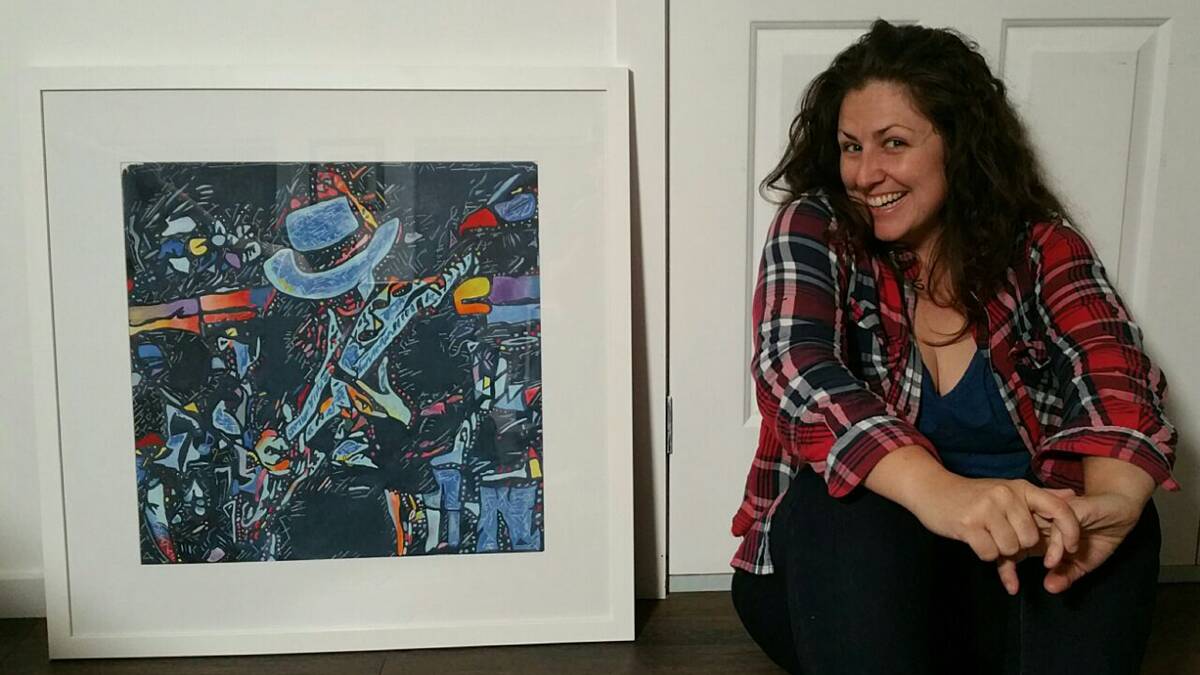 Samantha Yates with her Gulgong exhibition entry of Stevie Ray Vaughan which took out top prize.
