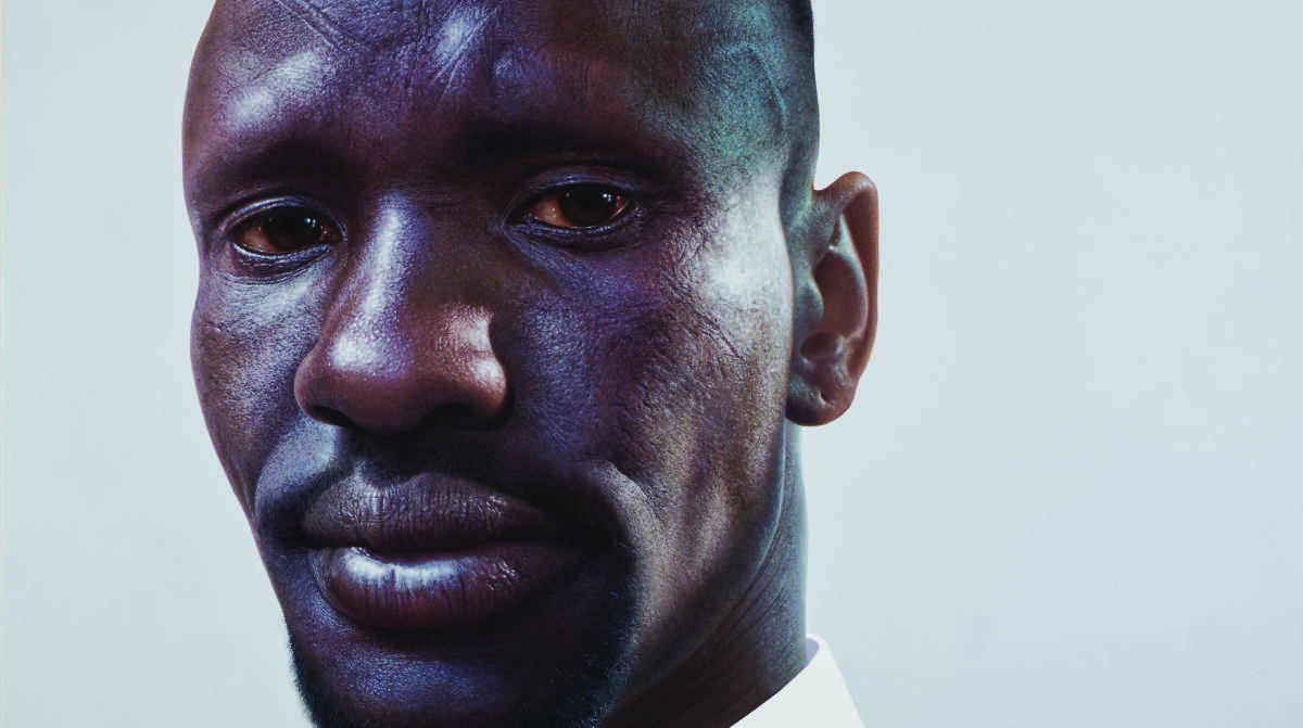 Nick Stathopoulos' portrait of Deng Adut, the NSW Australian of the Year in 2016. Now a defence lawyer and refugee advocate, he was a child soldier in South Sudan.