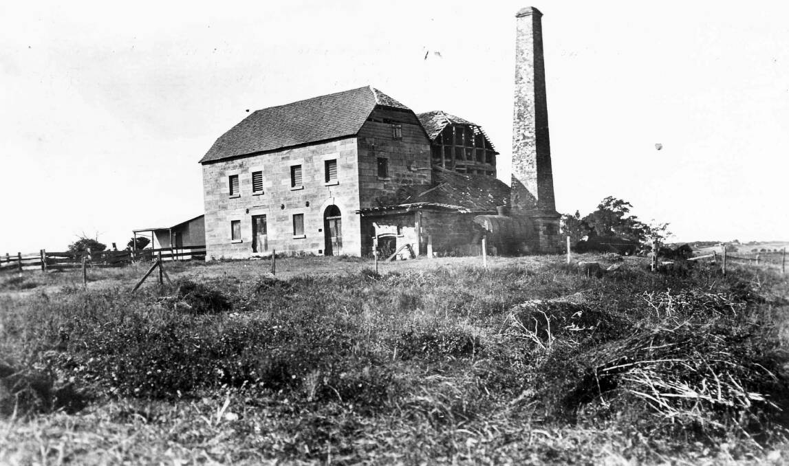 Buttsworth Mill near Buttsworth Creek, Wilberforce showing sandstone mill building, steel boiler and brick chimney c. 1915. Courtesy of the National Library of Australia, Box 197 Mills NLAref97923.