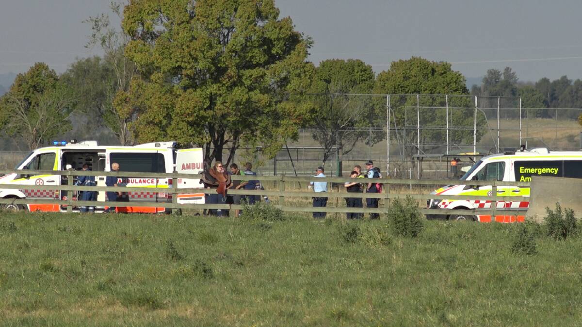 Ambulance crews at the site near where the woman fell from her horse. Picture: TNV Webcam