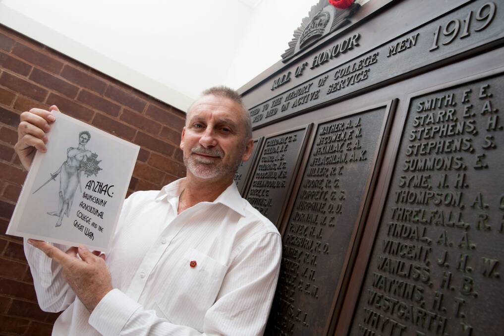 Author Peter Lister with his extraordinary work at the World War I honour roll at the old Hawkesbury Agricultural College campus - now WSU. Picture: Geoff Jones
