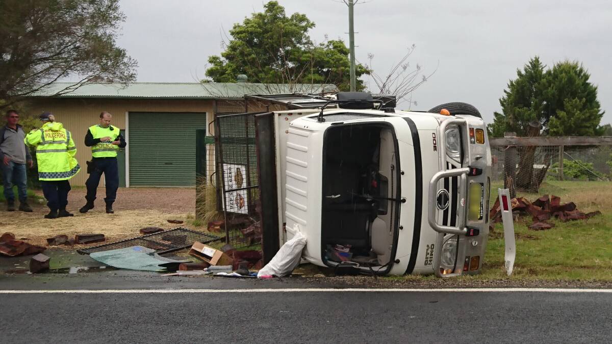 The driver was uninjured after his trucked rolled on East Kurrajong Road this afternoon. Picture: Jason Webster, TNV Webcam