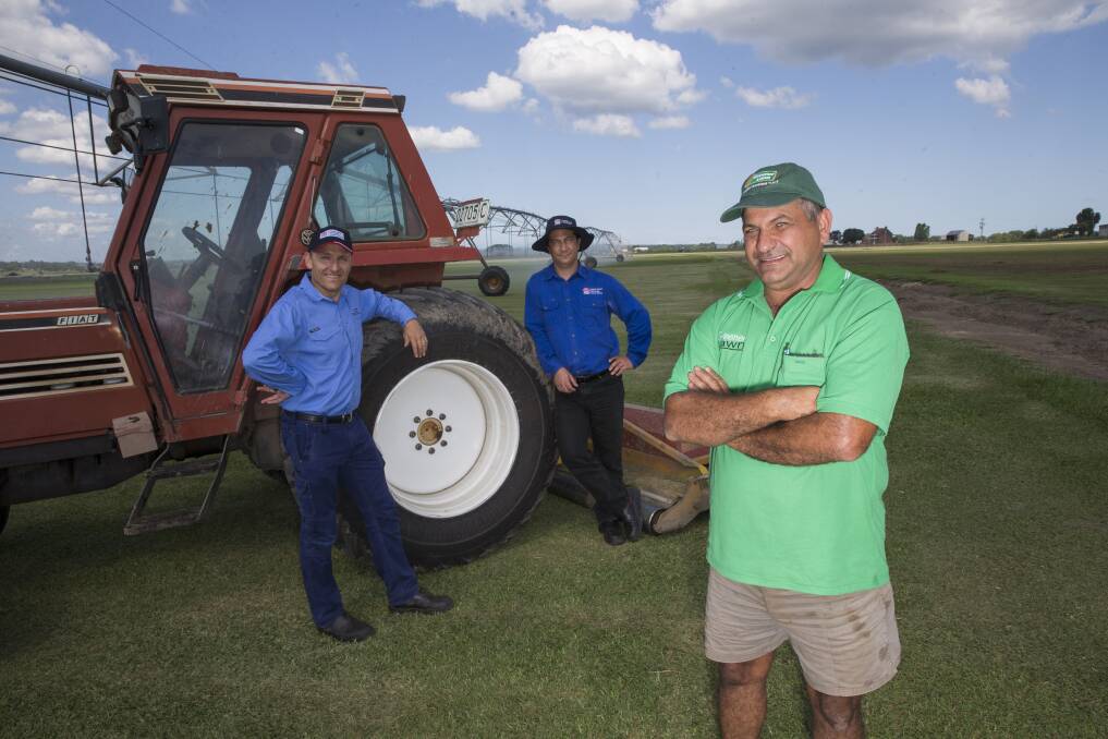 Freemans Reach turf farmer Anthony Muscat, front, with Greater Sydney Local Land Services officer Matt Plunkett and GSLLS manager Paul Bennett. Picture: Geoff Jones