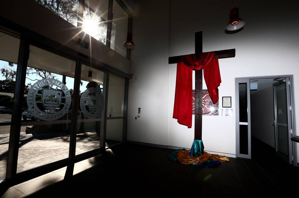 The Way of Mercy cross in the foyer of Notre Dame University's building at Hawkesbury Hospital on Friday morning, August 26. The cross was made in 1990 at St Monica's in Richmond and was carried into the church every Good Friday. Picture: Geoff Jones