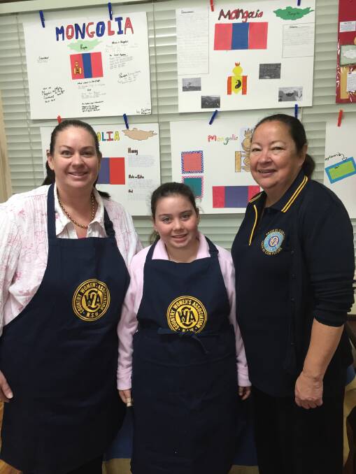 Maddison Ferrara, centre, is CWA Richmond's youngest member. She's pictured with mum  Megan Ferrara and Allyson Oehm.