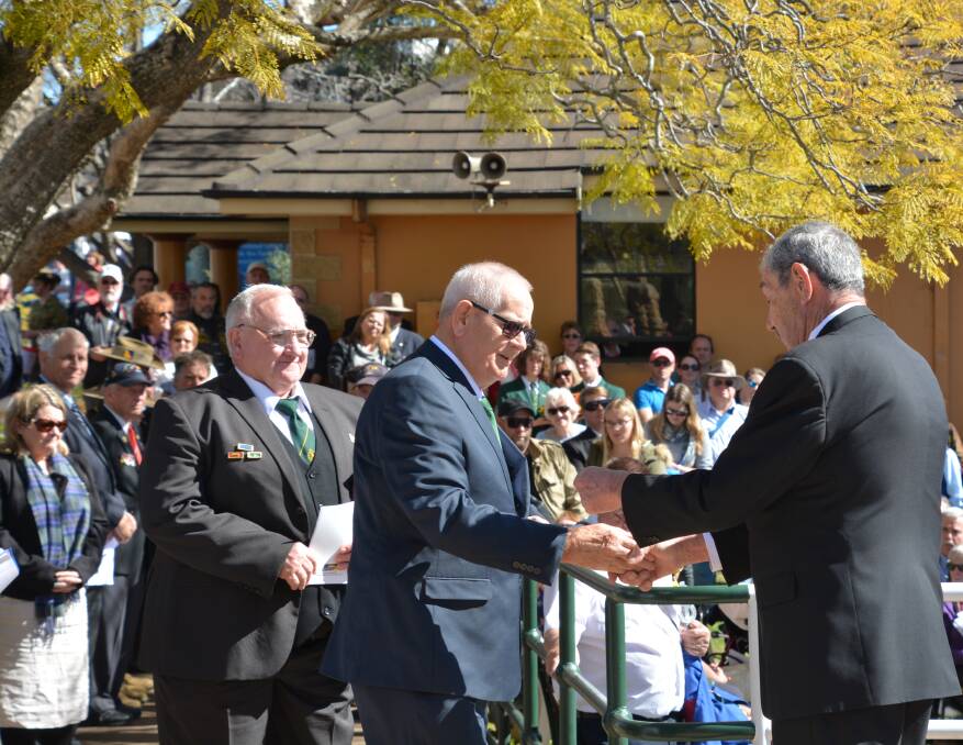 Battle of Long Tan veterans Tom Humphries and Terry Ryan at the Springwood Vietnam Vets' Day. Picture: Damien Madigan