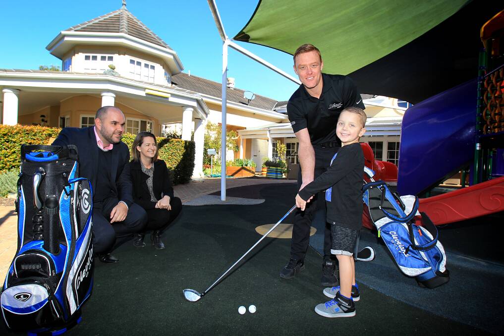 Blayze Berglund, 6, got some pointers from Brent Adams, Belinda Woolford and Lynwood Country Club's Eamonn Sleigh. Picture: Isabella Lettini