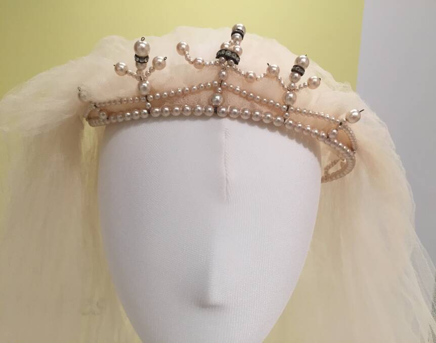 Brides of long ago: this pearl tiara from the 1930s supports a very fragile cotton tulle veil.