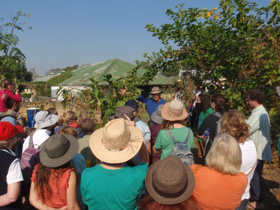 Eric Brocken teaches the crowd about organic farming at a recent open day at the famous EarthCare Centre at WSU, Richmond. 