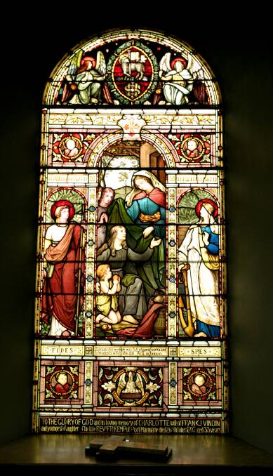 One of the breathtaking stained glass windows added in 1891, donated by Joseph Onus Jr.