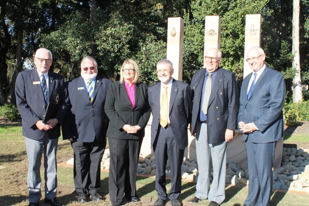 The new memorial will be a bigger version of this one, now at WSU Richmond campus. Pictured at its opening last July are Richmond RSL Sub-branch president Ron Gray; Windsor & District RSL Sub-branch president Geoff Brand, Macquarie MP Louise Markus; WSU Chancellor Professor Peter Shergold AC; RSL State vice president John Haines and WSU Vice Chancellor Barney Glover.