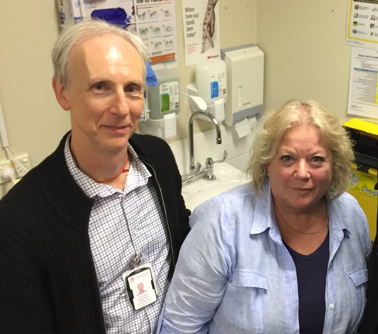 Hawkesbury Hospital's deputy director for community health Colin Ellis with palliative care clinical nurse specialist Keri Laurence in Colin's office earlier this year. 