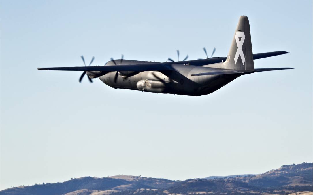 SHOW OF SOLIDARITY: The RAAF's white ribboned Hercules will conduct a flypast over Blacktown Workers Club on Monday morning in a show of solidarity against domestic violence.