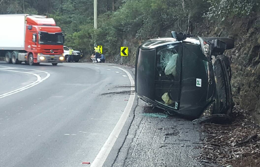 This vehicle flipped on its side yesterday afternoon on Bellbird Hill between Kurrajong Hills and Kurrajong Heights. Picture: Jayden Webster, TNV Webcam