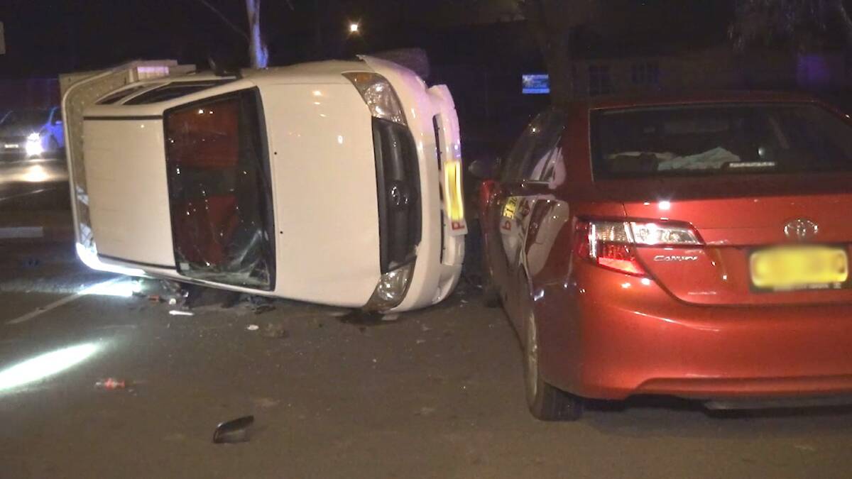 The man's white HiLux ute ended up on its side, prompting the offender to run off. Picture: TNV Webcam