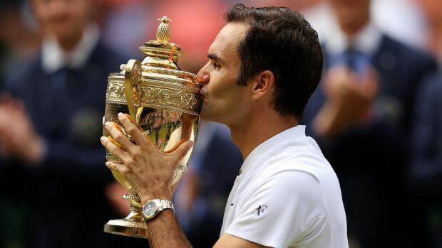 A familiar sight: Federer kisses the trophy after beating Marin Cilic. Photo: Getty Images