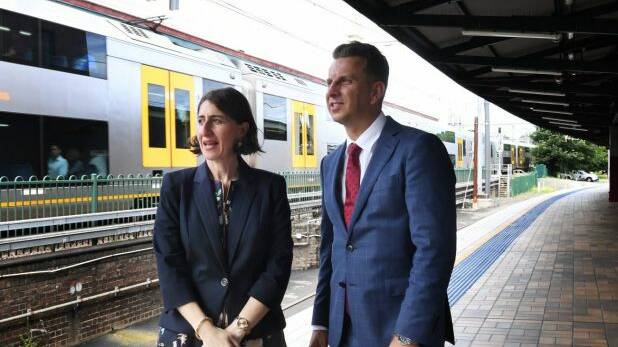 Premier Gladys Berejiklian and Transport Minister Andrew Constance at Central Station on Wednesday. Photo: Peter Braig