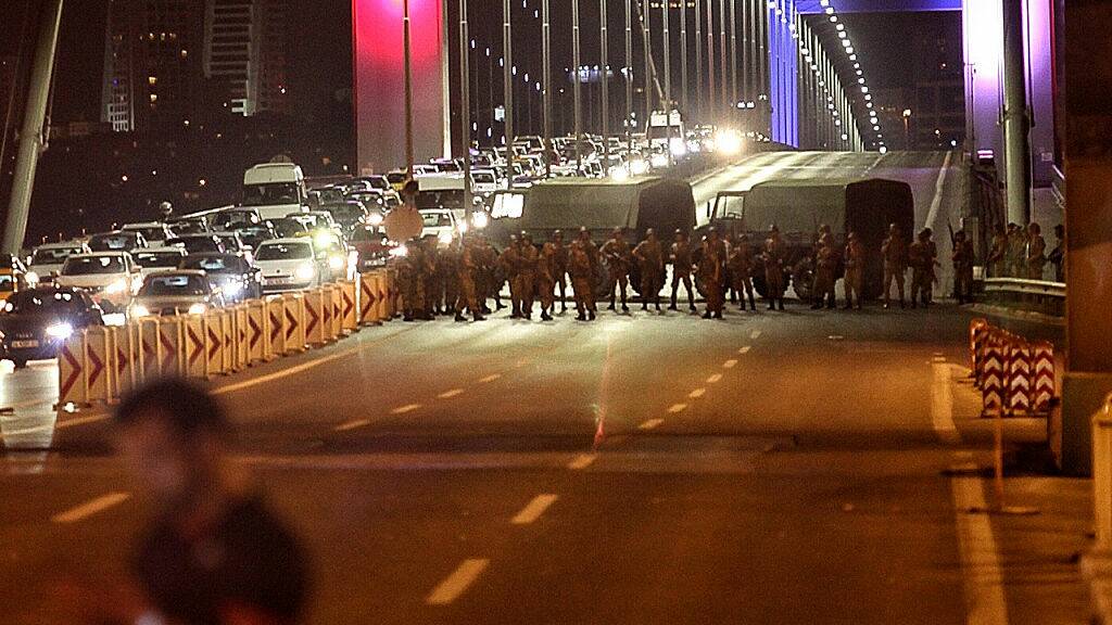 COUP: Turkish soldiers block Istanbul's Bosphorus Bridge on July 15, 2016 in Istanbul, Turkey. Reports have suggested that a group within Turkey's military have attempted to overthrow the government. Photo by Gokhan Tan/Getty Images