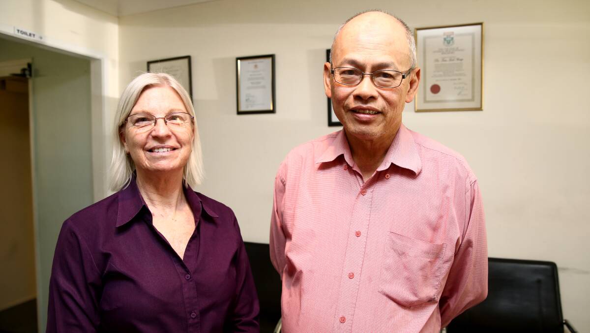 SERVING THE COMMUNITY: Dr Kevin Tan at his Bligh Park Surgery with surgery manager of 15 years Kerry Baldwin. Picture: Geoff Jones