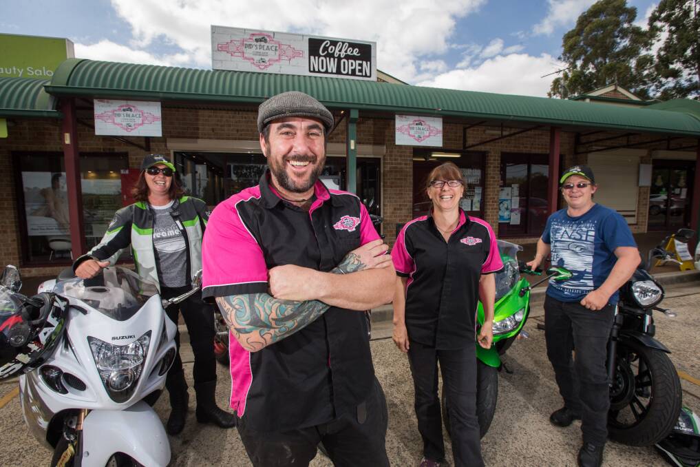 GIVING BACK: Josh and Pamela (Pip) Smith (pink shirts) with Cindy McErlane and Kylie Ramsay out the front of Pip's Place in North Richmond. Picture: Geoff Jones