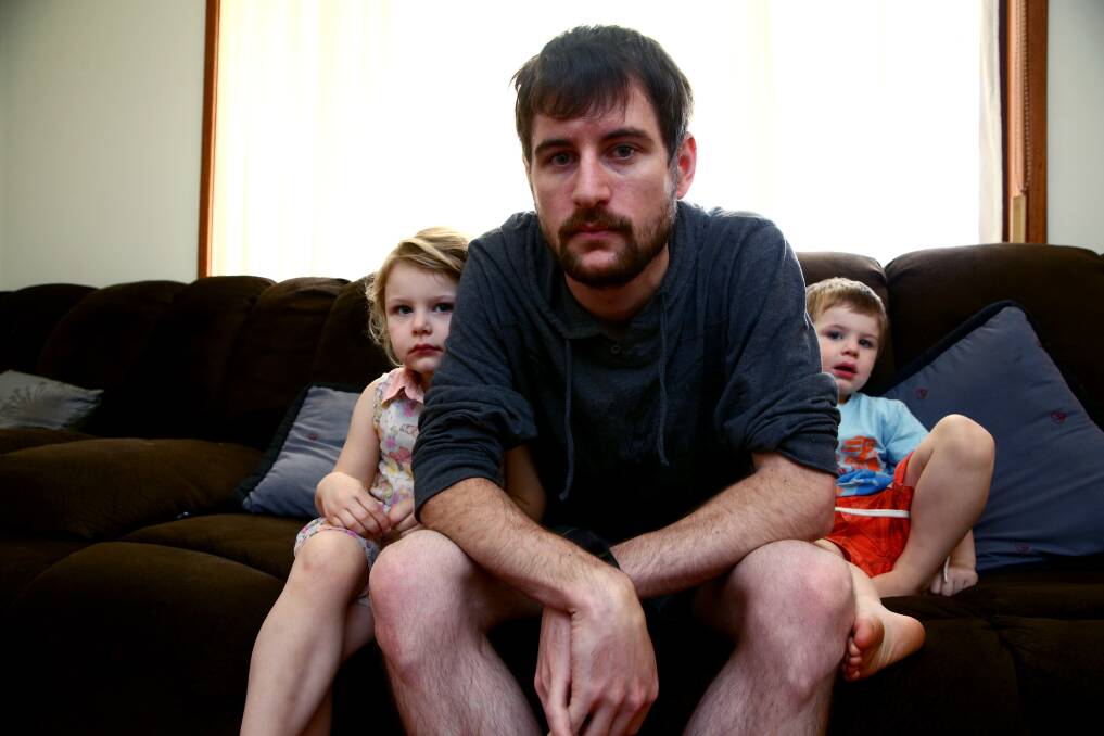 SUPPORT: Simon Griffin with his two children Emme (4) and Eli (3) at their Bligh Park home. Picture: Geoff Jones