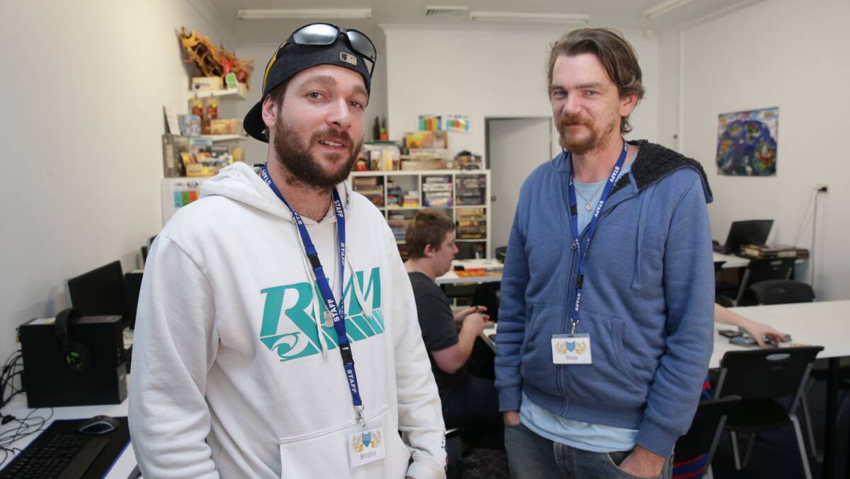 Top of their game: Simply Gaming co-owners Stephen and Adam in their new Richmond store. Picture: Geoff Jones