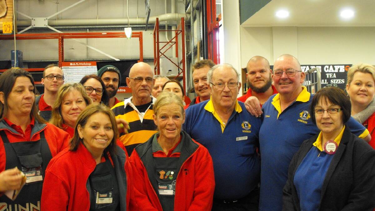 THANK YOU: The team from Bunnings and Windsor Lions gathered to raise money for Bill's cancer treatment.
