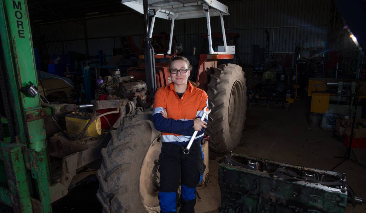 MISS FIX IT: 21-year-old Louise Azzopardi works as a heavy vehicle mechanic at The Tractor Shop in Glossodia. Picture: Geoff Jones