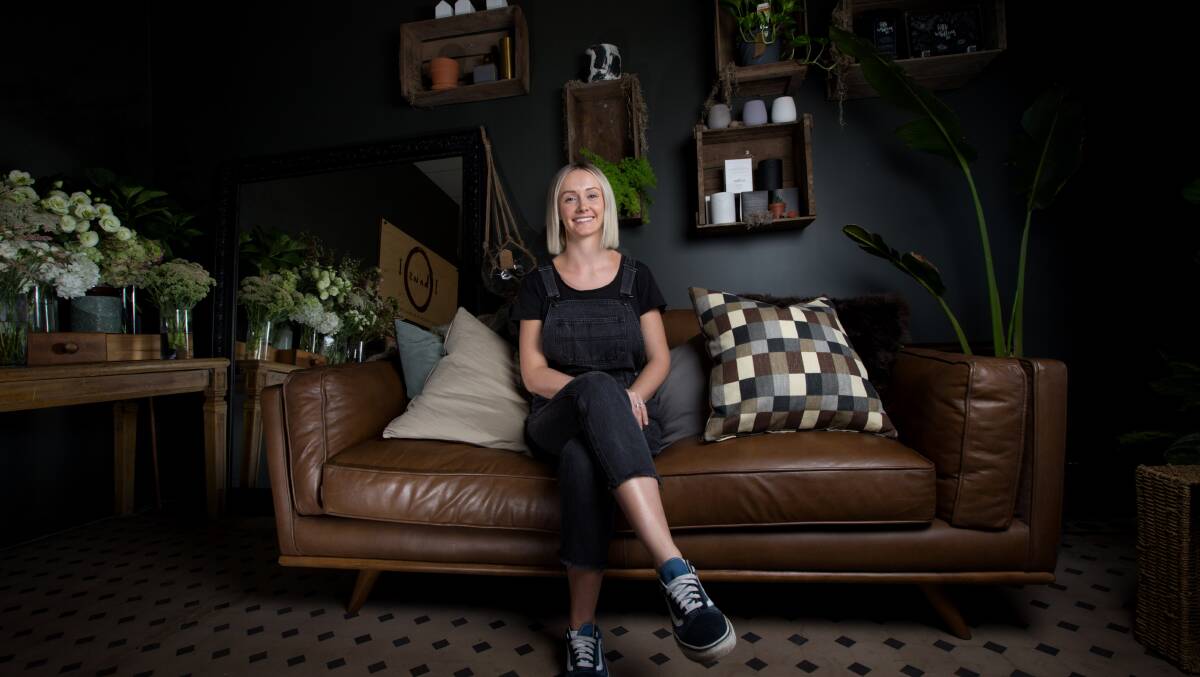 NEW LIFE: Laura Jessop-Smith in her Haus 101 florist business located in the old cinema on George Street.