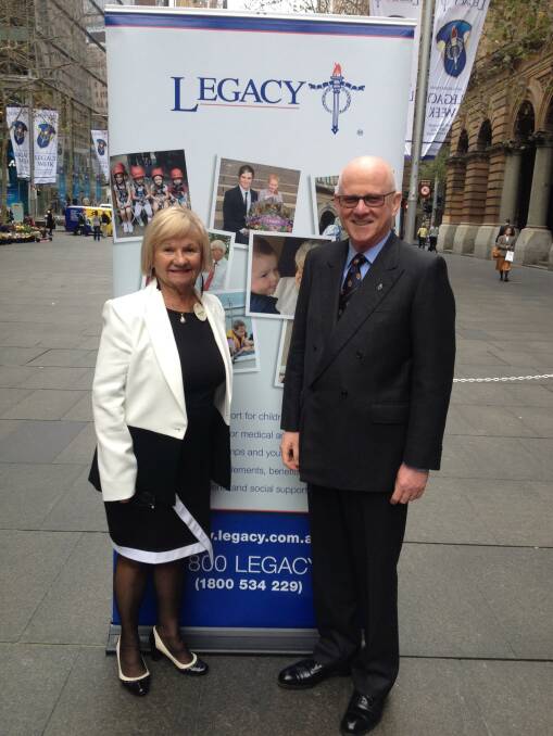 HONOUR: Di Finch with Sydney Legacy President Colin Dunston at the launch of Legacy Week in Martin Place on Monday.