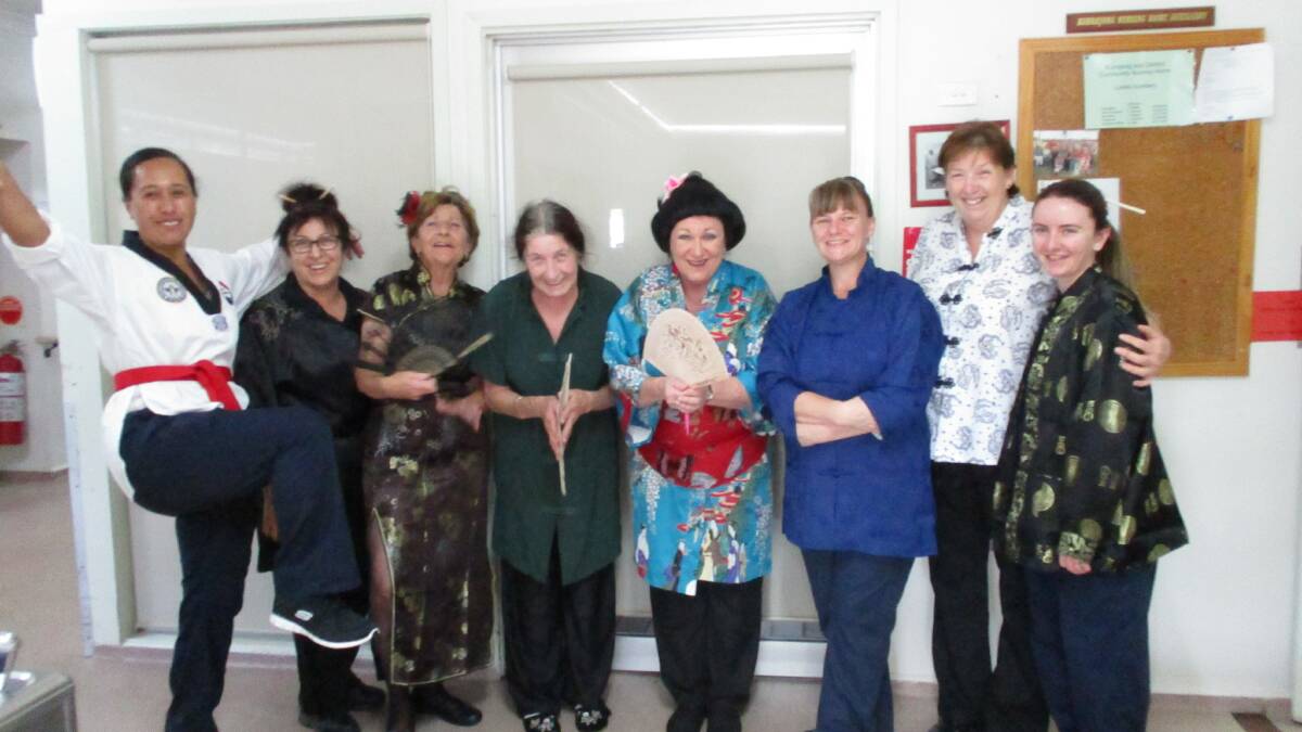 DRESS-UPS: Staff members Carolina, Mary, Kay, Sue, Sandy, Veronica, Julie and Bec. Picture: Supplied