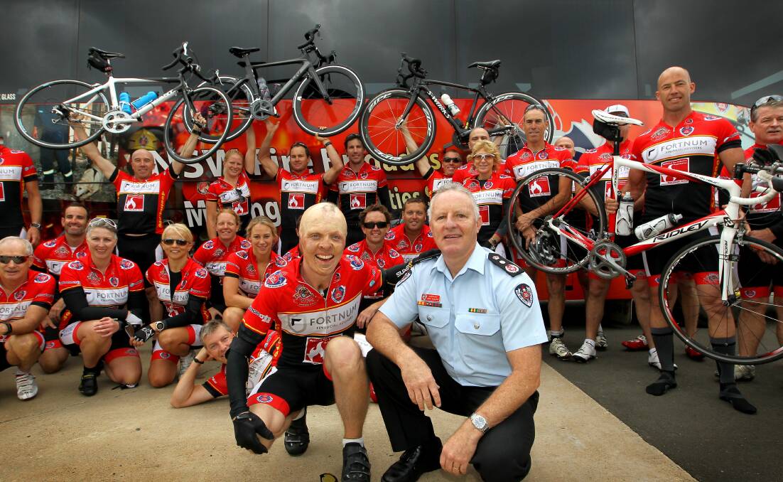 Charity ride: Burns victim Karl Madderom with Commissioner Greg Mullins, and the 400 in 4 Charity Bike Ride team ahead of their 2015 ride. Picture: Jeff de Pasquale