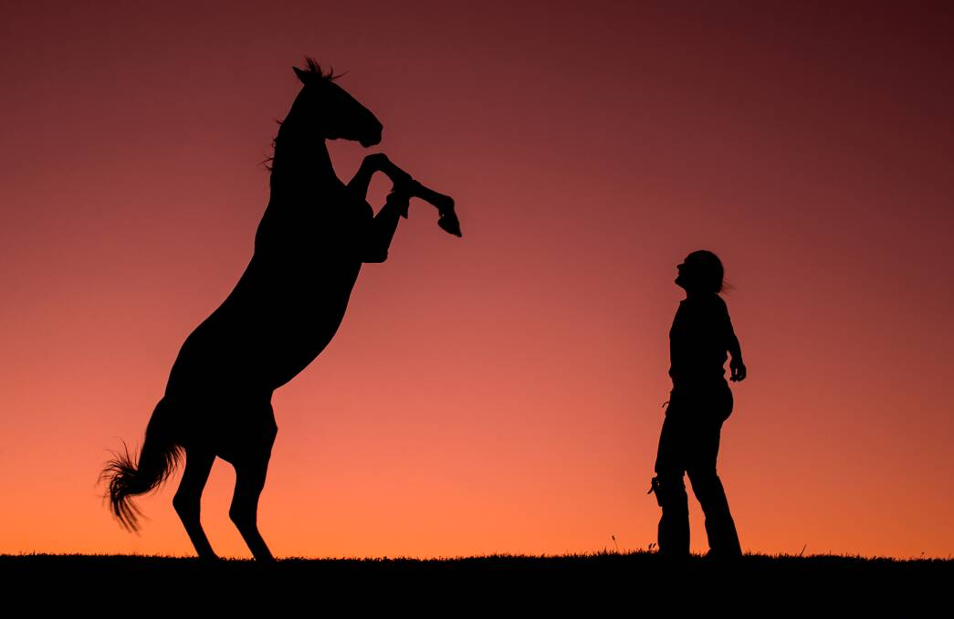 One of the featured photographs by Geoff Jones that will be on display at Richmond School of Arts. Pictured is animal trainer Kirstin Feddersen and her horse Aleeko.