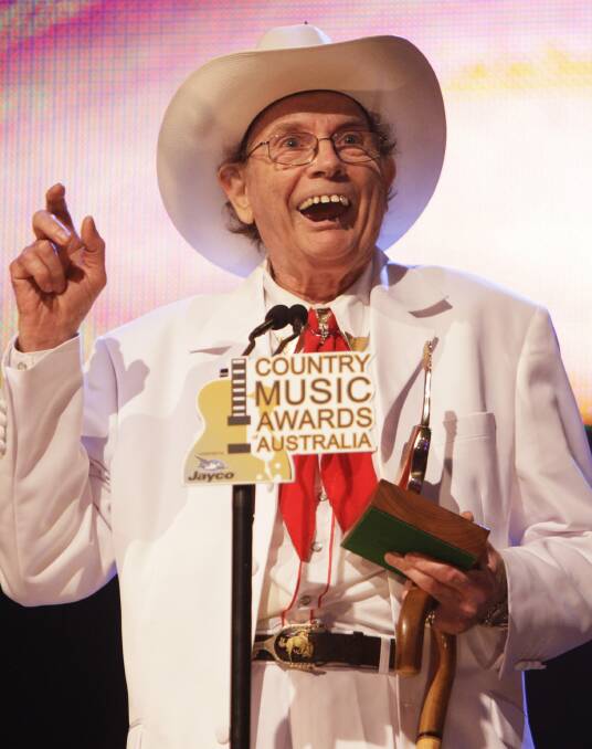 Life of achievement: Chad Morgan with his life time achievement award at the 2010 Country Music Awards of Australia in Tamworth. Picture: James Brickwood