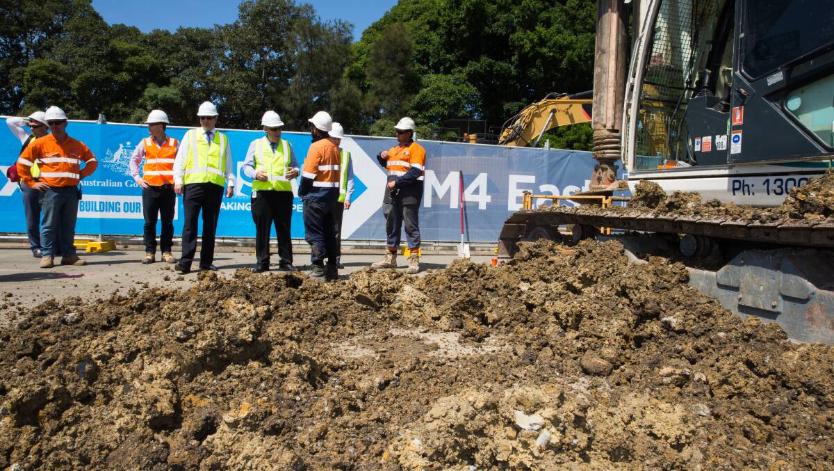 Politicians and project officers at the Westconnex site last year.