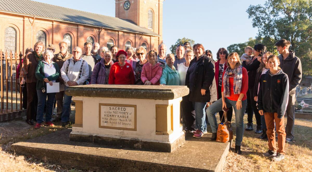 Family gathering: Kable family descendants gathered around the tomb of Henry Kable and Susannah Holmes at St Matthews, Windsor. Picture: Danielle Jeffs
