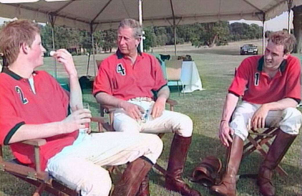 Prince Harry, Prince Charles and Prince William at a polo match at Cowarth Park Polo Club Sunninghill, England in 2003. Picture: AP Photo/ITN Pool