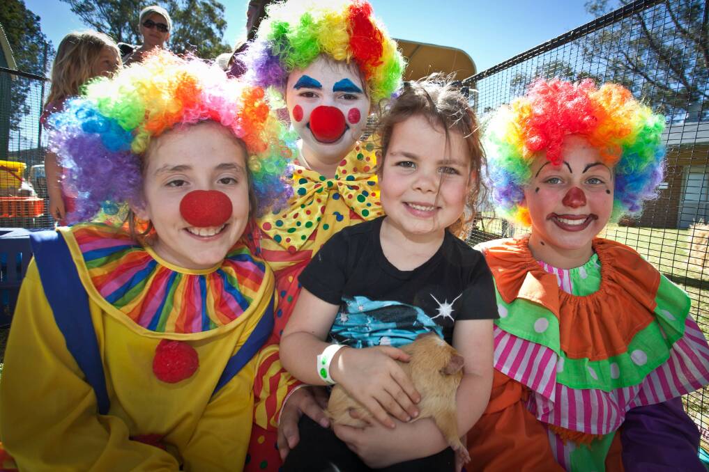 CLOWNING AROUND: Georgia Rughetta with Brooke Smith, Emily Deece and Alexis Dorbis, photographed at a previous Maroota Muster. Picture: Geoff Jones