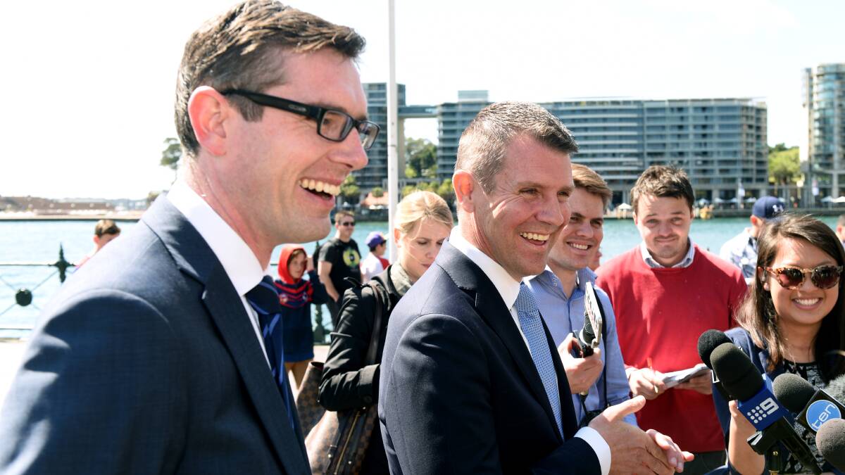 Fairfax Media has reported that Dominic Perrottet, pictured here with Mike Baird, could become deputy Premier of New South Wales. Photo: Steven Siewert
