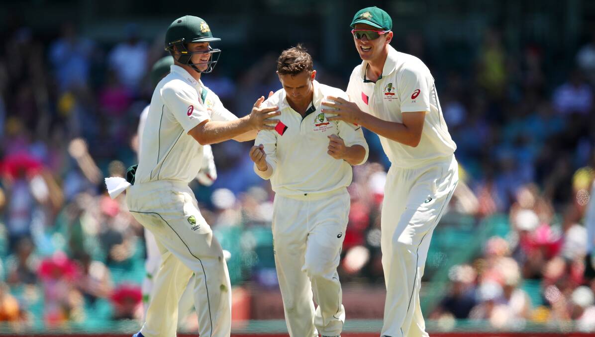 CELEBRATES: Steve O'Keefe and team mates are jubilant after O'Keefe dismised Misbah-ul-Haq on day five of the third test against Pakistan. Picture: Getty Images