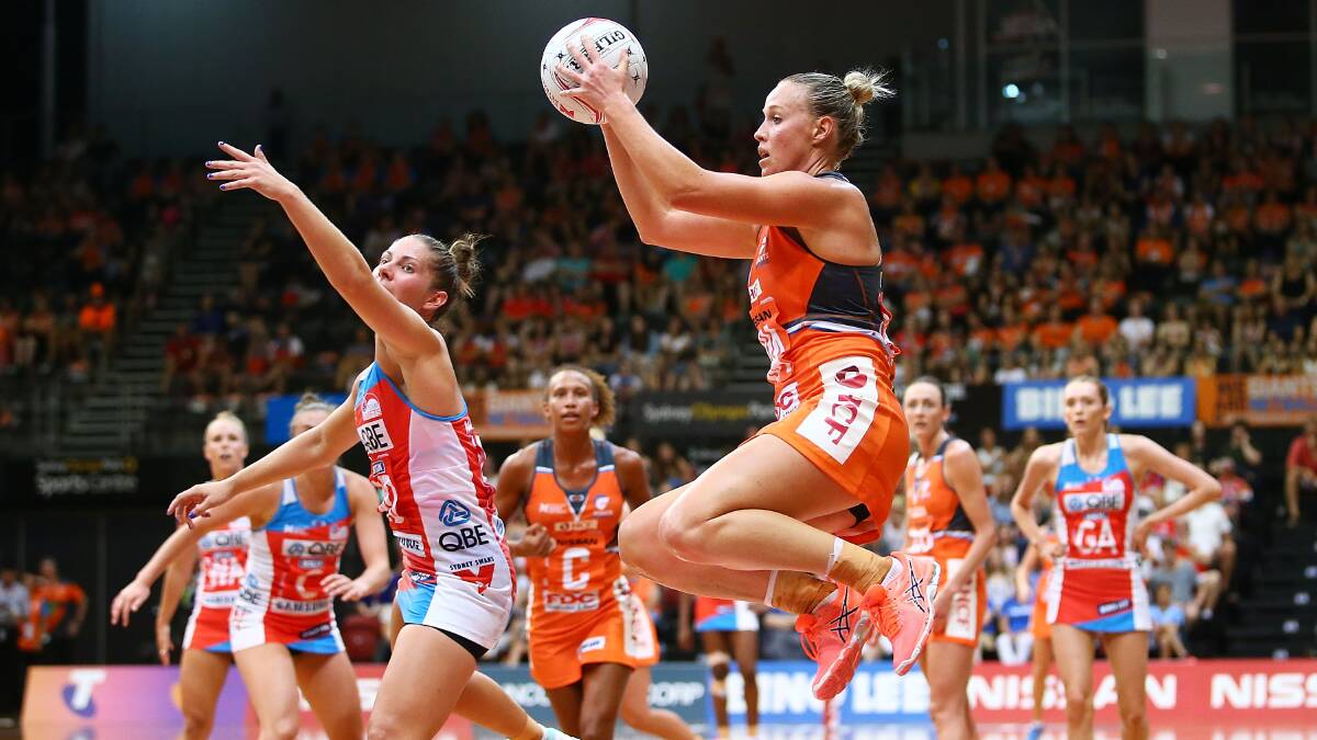 LEAPS: Giants captain Kimberlee Green in action. Picture: Getty Images