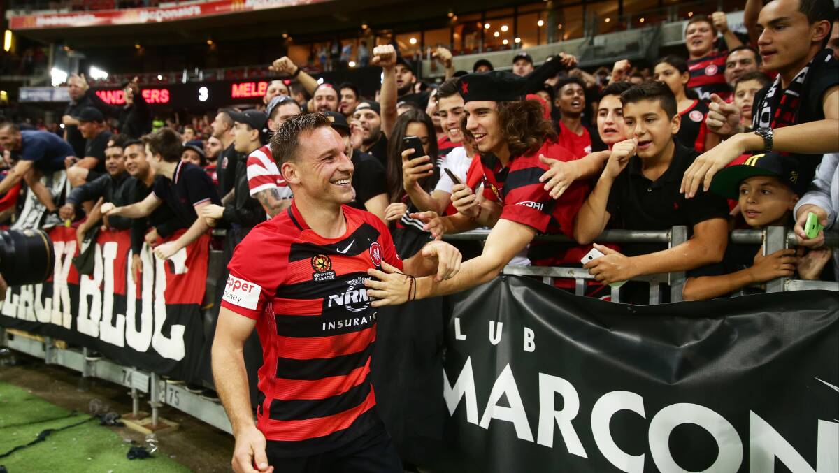 MAGIC: Brendon Santalab celebrates with fans. Picture: Getty Images