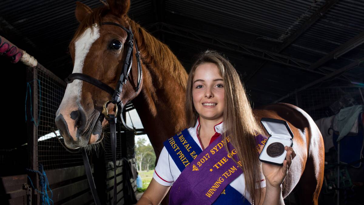 JUMPER: Lucie Aldridge and her team won first place in a pony club event at the Royal Easter Show. Picture: Geoff Jones
