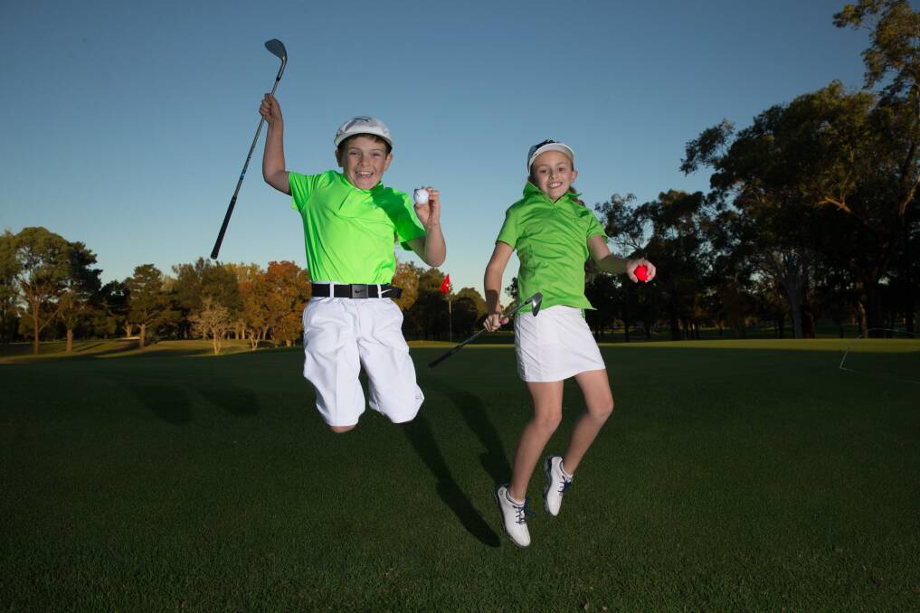 Ti Fox and Imogen Carter were jumping for joy when they won an invitation to the US Kids Golf World Championship at Pinehurst Resort in the US. Picture: Geoff Jones