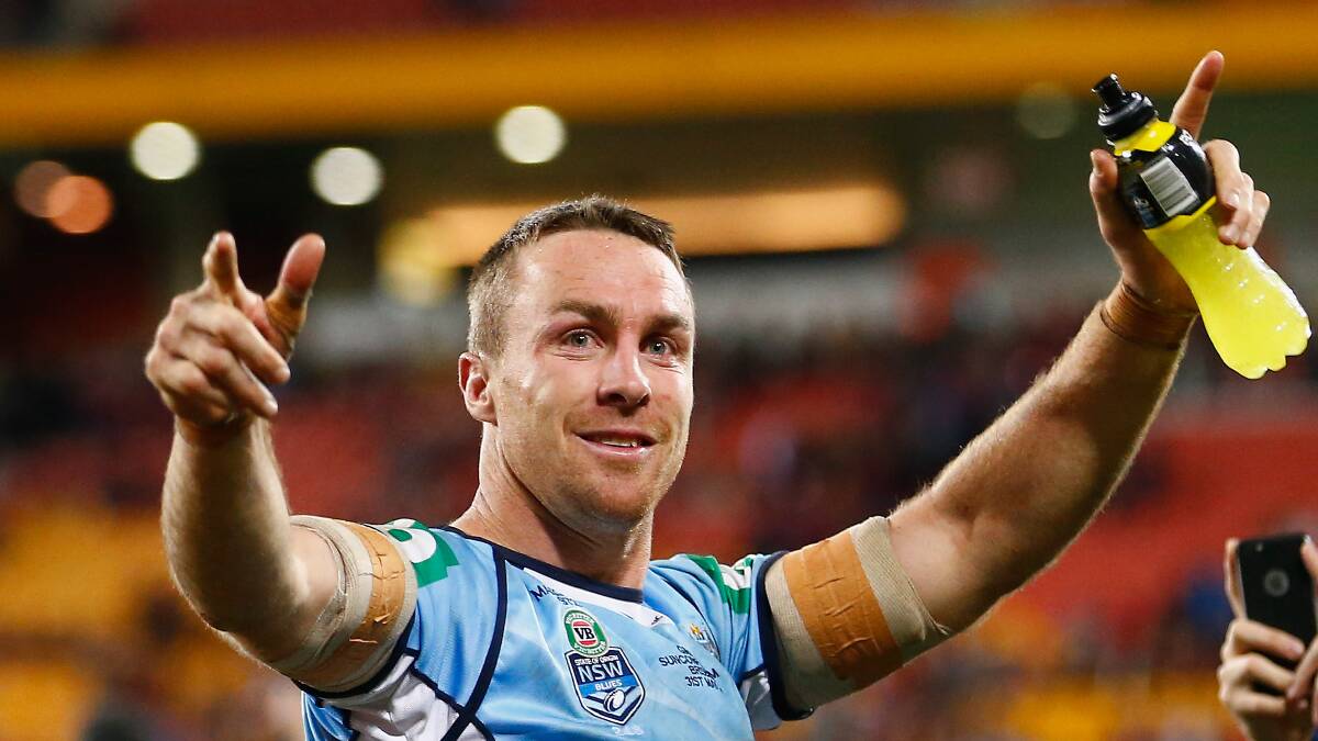 James Maloney celebrates after helping the NSW Blues win the first State of Origin game in Queensland. Picture: Getty Images