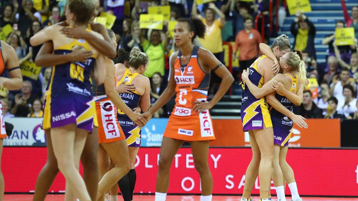 TOO GOOD: Sunshine Coast Lightning players celebrate as Giants player Serena Guthrie shakes hands with a team mate. Picture: Getty Images