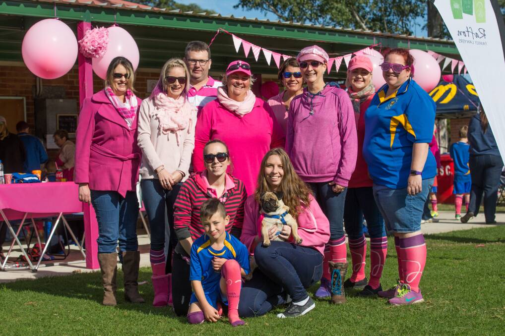 COMMUNITY SPIRIT: People dressed in pink at Icely Park on Saturday. Picture: Geoff Jones
